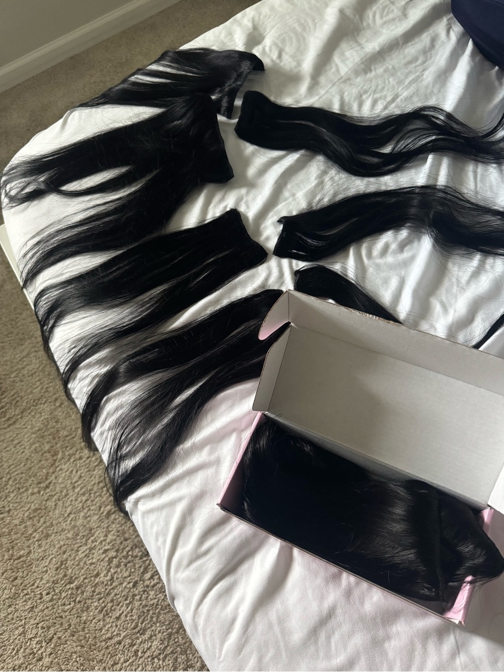 Two packages of Natural Black Clip-In Straight Hair Extensions – Seamless Volume